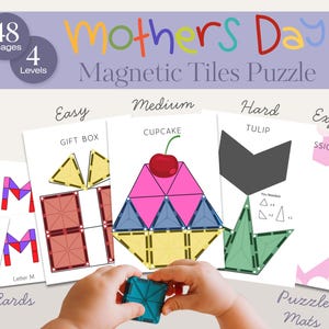 May include: A Mother's Day magnetic tiles puzzle set with 4 levels and 48 images. The set includes puzzle mats and cards with shapes like a gift box, cupcake, tulip, and heart. A child's hand holds a blue tile.