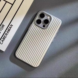 custodia per telefono in stile valigia