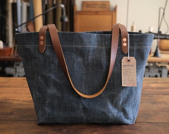 waxed canvas tote with shoulder strap