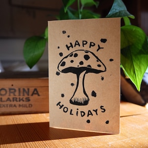 Tarjeta de setas navideñas, impresa en bloque
