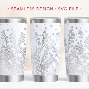 May include: Three stainless steel travel mugs with a white background and a silver floral design. The mugs have a silver lid and base. The text "SEAMLESS DESIGN • SVG FILE" is at the top.