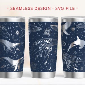 May include: Three stainless steel tumblers with a navy blue background and a seamless design featuring whales, constellations, moons, and suns. The text "SEAMLESS DESIGN • SVG FILE" is at the top.