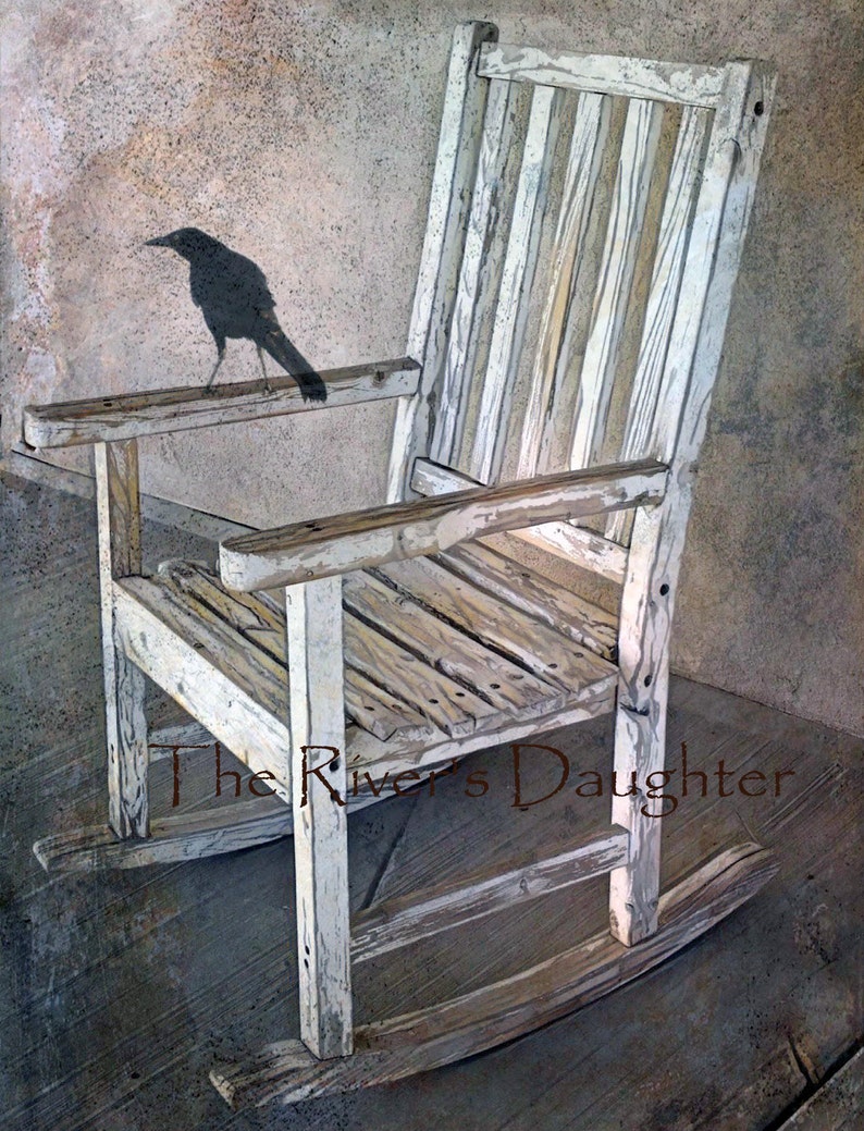May include: A weathered white rocking chair with a bird silhouette on the armrest. The chair is on a wooden floor with the text "The River's Daughter" visible in the foreground.