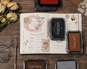 Metallic Pigment Ink Pad, specially designed for journaling, available in gold, silver, black, red.