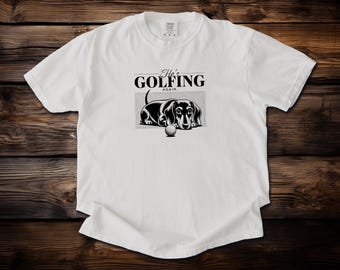 Comfort Colors® He's Golfing: Funny Dachshund Dog Golf T-Shirt for Golf Lovers and Wiener Dog Fans