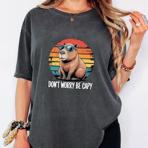 Don’t Worry Be Capy T-Shirt, Retro Capybara Shirt, Funny Animal Tee, Capybara with Sunglasses, Kids and Adults Shirt, Chill Vibes Tee