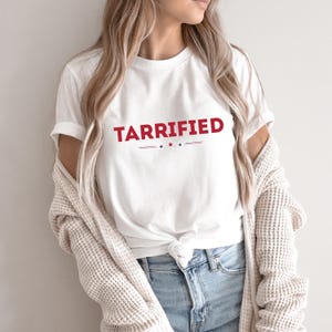Tarrified Shirt, Funny Tariff Pun Tee, Sarcastic Political Humor Shirt, Patriotic Wordplay Gift, Red White Blue Stars T-Shirt
