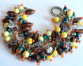 Southwest Beaded Charm Bracelet, Yellow Green Turquoise & Brown Glass Beads With Charms