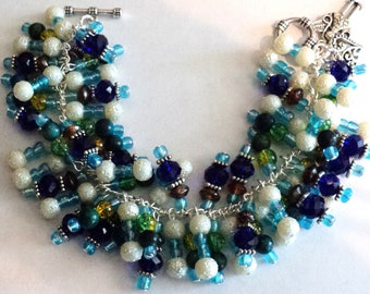Perlen Bettelarmband, Blau, Grün, Braun & Weiß - Guardian Angel