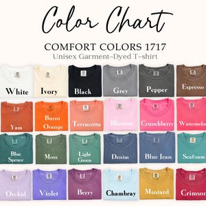 May include: Color chart showing 20 different colors of unisex garment-dyed t-shirts. The colors include white, ivory, black, grey, pepper, espresso, yam, burnt orange, terracotta, blossom, crunchberry, watermelon, blue spruce, moss, light green, denim, blue jean, seafoam, orchid, violet, berry, chambray, mustard, and crimson.