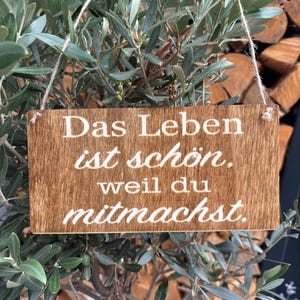Beautiful wooden sign with a loving saying