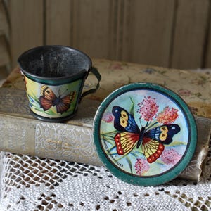 Vintage Ohio Art Tin Tea Cup and Plate 1930's Collectible Ohio Art. Tin toy teacup and plate, vintage Colorful Butterflies