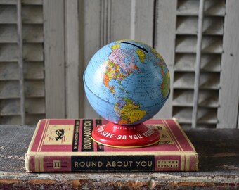 Vintage Ohio Art Globe Bank & 1935 Buch 'Round ungefähr Sie'