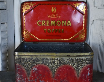 Antica latta Art Nouveau: litografia rossa e oro, bambini che giocano