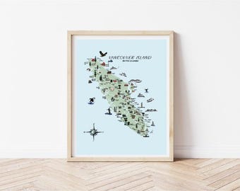 May include: A framed map print of Vancouver Island, British Columbia, set against a light blue background. The map features a pale green landmass illustrated with various small icons of wildlife, landmarks, and activities, with a compass rose.