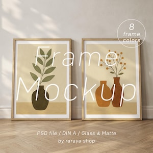 May include: Two framed illustrations of stylised plants in vases. The frames are a light wood colour and the illustrations are on a cream background. The text "Frame Mockup" is superimposed over the images.