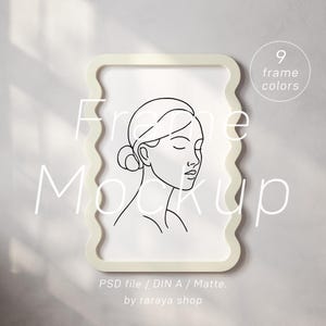 May include: A white frame with a wavy edge, featuring a line drawing of a woman's face. The frame is on a light gray background. The text "Frame Mockup" is written in black on the image. The text "9 frame colors" is written in black on the image.