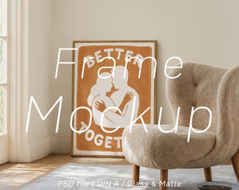 Puede incluir: Una impresión artística enmarcada con las palabras "BETTER TOGETHER" y una ilustración de dos figuras abrazándose. El marco se exhibe en una habitación con un sillón beige y una alfombra de color claro.