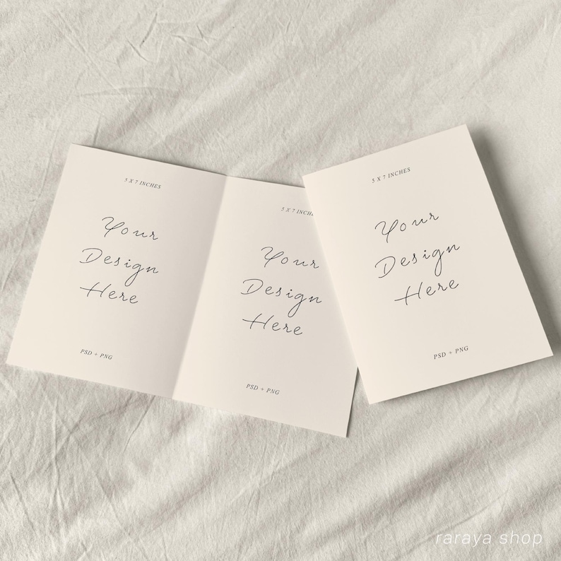 May include: A folded card mockup with three panels. Each panel has the text "Your Design Here" and the dimensions "3.5 x 5 inches" printed on it. The card is on a white fabric background.