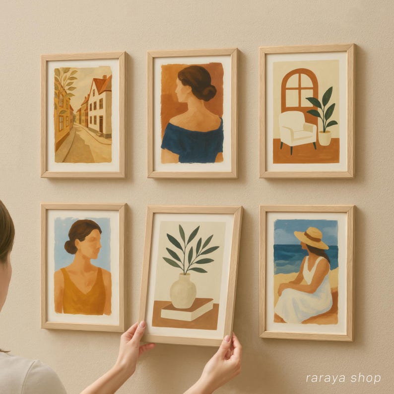 May include: A set of six framed illustrations featuring various scenes, including a city street, a woman in a blue dress, a potted plant, a woman in a yellow dress, a potted plant, and a woman sitting on a beach. The frames are all made of light wood and have a simple, modern design.