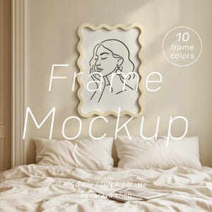 May include: A framed art mockup featuring a black and white line drawing of a woman's face. The frame has a wavy, cream-colored border. The words "Frame Mockup" are written in white, along with "10 frame colors". The image is set above a bed.