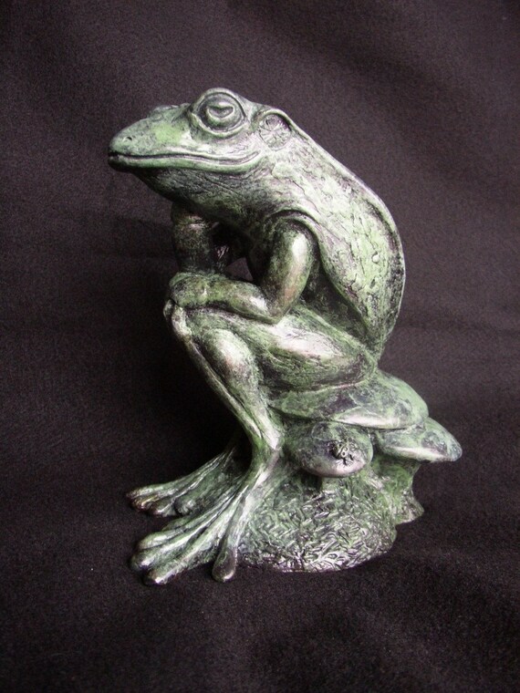 thinking frog statue