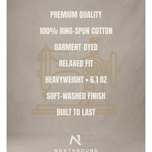 May include: A beige informational graphic featuring a sewing machine outline and white text: PREMIUM QUALITY, 100% RING-SPUN COTTON, GARMENT-DYED, RELAXED FIT, HEAVYWEIGHT 173G, SOFT-WASHED FINISH, BUILT TO LAST, and the NORTHBOUND logo at the bottom.