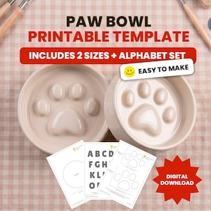 Op de afbeelding: Twee beige keramische pootkommen met pootafdrukontwerpen, vergezeld van afdrukbare sjablonen en een alfabetset. De tekst op de afbeelding luidt "PAW BOWL PRINTABLE TEMPLATE" en "INCLUDES 2 SIZES + ALPHABET SET". Digitale download beschikbaar.