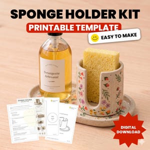 May include: A sponge holder kit with a printable template. The image shows a ceramic sponge holder with floral designs, a bottle of liquid soap, a yellow sponge, and instructions. The text reads "Sponge Holder Kit" and "Easy to Make".