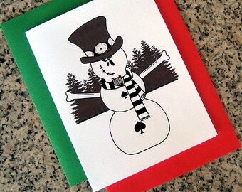May include: A black and white illustration of a snowman wearing a top hat and a striped scarf. The snowman has a stitched smile and a spade symbol on its belly. The background is a forest of trees.