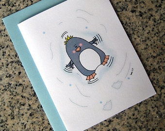 adorable penguin making a snow angel holiday christmas cards (blank or custom printed inside) with blue envelopes - set of 10