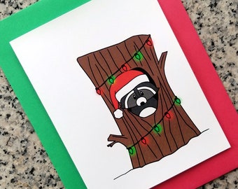 cute raccoon in tree wearing a santa hat holiday christmas cards (blank or custom inside) with red or green envelopes - set of 10