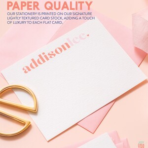 May include: A white card with a pink and white textured surface. The text "addisonlee." is printed in pink on the card. The card is surrounded by pink envelopes.