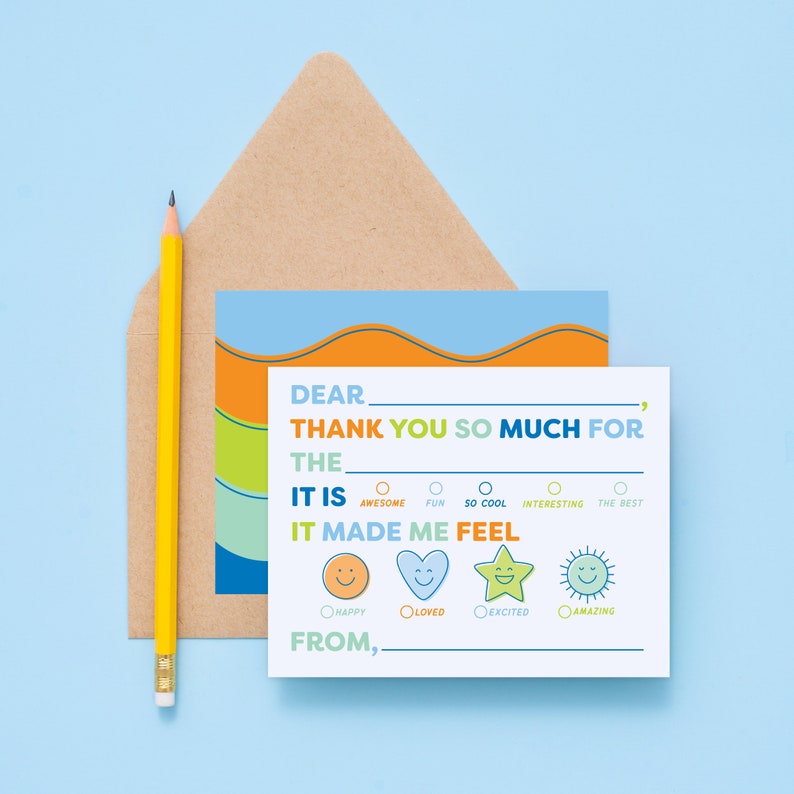May include: A white card with a blue, orange, and green border. The card says "Dear ____, Thank you so much for the ____. It is ____. It made me feel ____. From, ____". There are four circles with smiley faces to choose from: happy, loved, excited, and amazing.