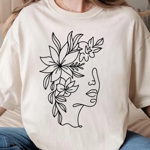 Minimalist Face Line Art Shirt – Elegant One-Line Floral Portrait Tee  Soft Artistic Design | Casual Boho Style for Modern Women