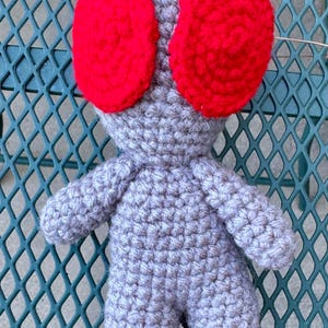 Crocheted alien plushie