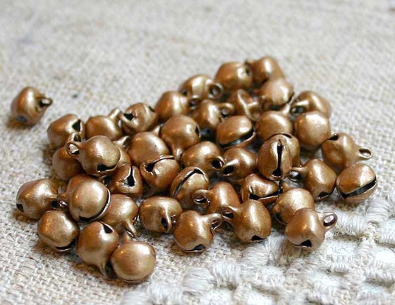 100Pcs Bronze Metal Christmas Jingle Bells Pendants Charms Craft Beads 6mm
