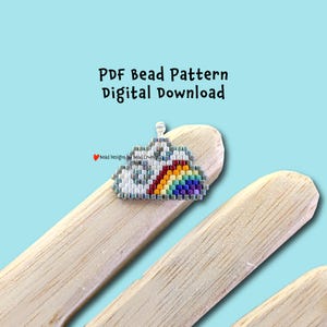 May include: A beaded cloud pendant with a rainbow design. The pendant is made of small, colourful beads and is displayed on a light blue background. Text on the image reads "PDF Bead Pattern Digital Download".