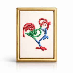May include: Embroidered artwork in a gold frame, depicting a rooster. The rooster design uses red, green, and blue thread on a cream background. The frame adds a decorative element to the artwork, which is suitable for wall display.