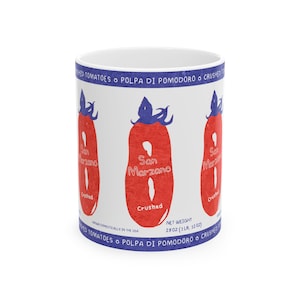 May include: White ceramic mug with a red and blue illustration of a tomato and the text "San Marzano Crushed Tomatoes • Polpa di Pomodoro • Crushed" on the side.  Net weight: 28 oz (1 lb, 12 oz).