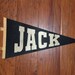 Anissa Castillo reviewed Boy's Personalized Sport Pennant -black pennant with gold letters and gold ribbon, sports, teams, wall decor, block letters