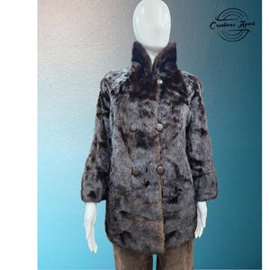 Beautiful Vintage Mink Jacket in Great Condition. It's Very Nicely Lined and Has New Leather Buttons.