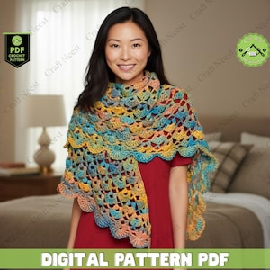 May include: A woman wearing a colorful, crocheted shawl with a scalloped edge. The shawl features shades of blue, yellow, and orange. The image includes text that reads "DIGITAL PATTERN PDF" and "PDF CROCHET PATTERN".