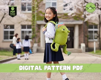 May include: A young person wearing a green crochet frog backpack, filled with books, stands in front of a school building. The backpack has frog legs and eyes. The image includes the text "DIGITAL PATTERN PDF".