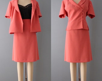 rouge pink skirt suit | cropped blazer and mini skirt set | barbiecore flower buttons suit