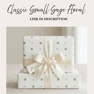 May include: Two gift boxes wrapped in white paper with a small green floral pattern. A cream-colored ribbon and bow adorn the top box, with a tag that reads "for you". The text "Classic Small Sage Floral" and "LINK IN DESCRIPTION" are at the top.