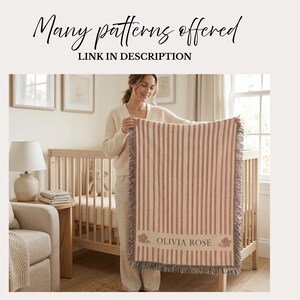 May include: A striped baby blanket in cream and mauve, held by a person. The blanket has a floral design and the name "OLIVIA ROSE" printed on it. The text "Many patterns offered" and "LINK IN DESCRIPTION" are at the top.