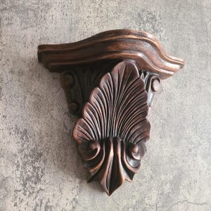 May include: A rustic wooden sign with the text "Welcome to our porch" in white lettering. The sign features a distressed finish and a simple, inviting design, perfect for outdoor decor.