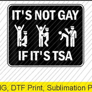 May include: Black rectangular sign with white text and stick figure illustrations. The text reads "IT'S NOT GAY IF IT'S TSA". The sign has a black background with white diagonal lines.