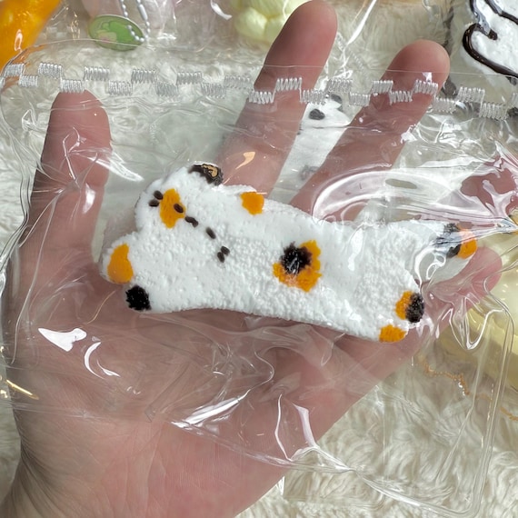 猫のスクイーズおもちゃ：かわいいフィジェットトイ、ストレス解消